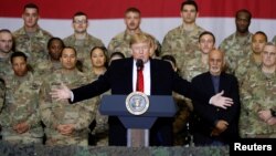 U.S. President Donald Trump delivers remarks to U.S. troops during an unannounced visit to Bagram Air Base on November 28.