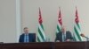 Президент Абхазии Аслан Бжания и вице-президент Бадра Гунба
