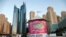 Dubai - A booth is seen on a beach in Dubai carrying the Expo 2020 logo, October 20, 2013. An international meeting in Paris next month may trigger billions of dollars of fresh investment in Dubai - and, if plans are not handled carefully, contribute to t