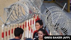 Шинжаңда жашаган мусулмандар.  31-май, 2019-жыл. (Сүрөттөгүлөрдүн макаланын каарманы менен байланышы жок) 