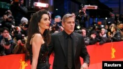 جورج کلونی به همراه همسرش