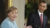 Germaniýanyň kansleri Angela Merkel (çepde) we Birleşen Ştatlaryň prezidenti Barak Obama Ak Tamda geçirilen metbugat konferensiýasynda, 7-nji iýun.