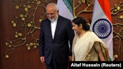 Ирандын жана Индиянын тышкы иштер  министрлери Мохаммад Жавад Зариф менен Сушма Свараж. Нью-Дели, 28-май, 2018-жыл. 