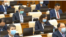 Kazakhstan – deputies of the Mazhilis of the Kazakh Parliament in plenary meeting. Nur-Sultan, 22Apr2020 TV screen shot 