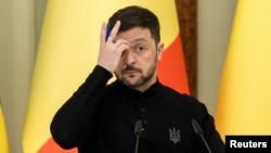 Ukrainian President Volodymyr Zelenskyy attends a press conference in Kyiv on April 8.