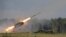 Russia -- A Russian TOS-1A multiple rocket launcher fires during the opening of the Army-2015 international military forum in Kubinka, outside Moscow, June 16, 2015