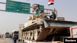 Конвой військової техніки іракських сил на шляху до Мосула