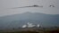 Nagorno-Karabakh - Armenian Mi-24 helicopters fire rockets during military exercises, 14Nov2014.