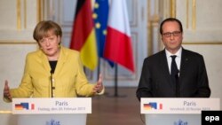 Меркел жана Олланд. Париж, 20-февраль, 2015-жыл.