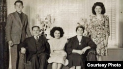 Armenia -- Titanic survivor Neshan Krekorian (seated) with younger daughter seated in middle, wife, Persape (seated right), son standing, and older daughter standing.