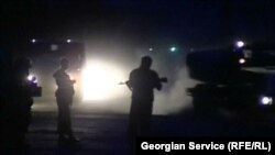 Грузинские военные на блокпосту в первые дни конфликта с Россией. Август 2008 года.