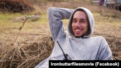 Роман Любий