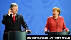Президент України Петро Порошенко і канцлер Німеччини Ангела Меркель, Берлін, 12 квітня 2019 року