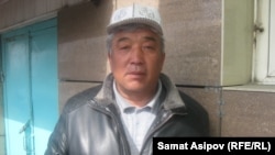 Азымкул Ракымбаев.