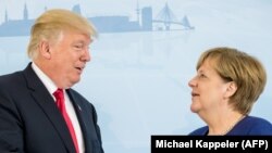 Дональд Трамп і Анґела Меркель під час зустрічі в Гамбурзі, 6 липня 2017 року