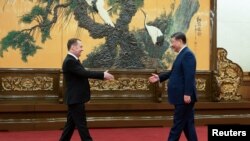 Дмитрий Медведев және Си Цзиньпин. Пекин, 12 жедтоқсан 2024 жыл. 
