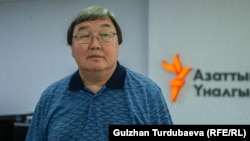 Зайнидин Курманов.