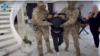 A screenshot from a video posted on the YouTube channel of the Security Service of Ukraine on May 9 shows the detention of a man suspected of espionage.