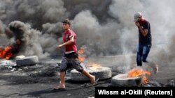 نمایی از تظاهرات در شهر بغداد