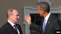 Prezident Barak Obama rus kärdeşi Wladimir Putin (Ç) G20-ler sammitinde, Peterburg, 5-nji sentýabr, 2013