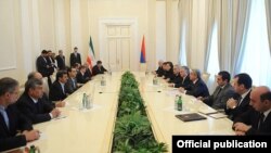 Armenia - Presidents Serzh Sarkisian and Mahmud Ahmadinejad lead Armenian-Iranian talks in Yerevan, 23Dec2011.