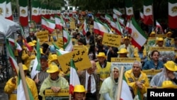 АКШдагы ирандыктардын жана президент Роуханинин оппоненттеринин БУУнун кеңсеси сыртындагы нааразылык акциясы. 25-сентябрь, 2018-жыл.