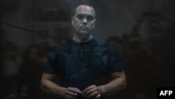 Vadim Kobzev appears in court in Moscow on October 13.