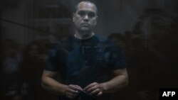 Vadim Kobzev appears in court in Moscow on October 13.