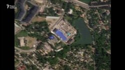 Последствия украинского удара по складу боеприпасов в здании Камаз-Центра в Донецке