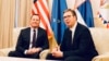 U.S. presidential envoy Richard Grenell (left) with Serbian president Aleksandar Vucic in Belgrade on October 10. 