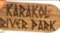 Каракол: суу жээгиндеги сейил бак