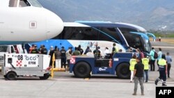 АКШдан чыгарылган мигранттар. Коста-Рика. Иллюстрациялык сүрөт.