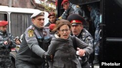 Armenia - Riot police detain a protester in Yerevan, 02Dec2013.