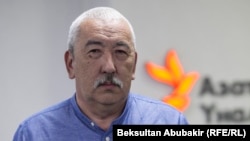 Исхак Масалиев.