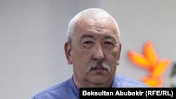 Исхак Масалиев.