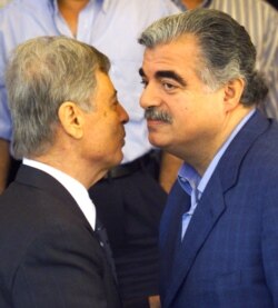 در کنار رفیق حریری، نخست‌وزیر وقت لبنان در سال ۲۰۰۱