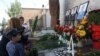 Armenia - Flowers are laid at a memorial in Yerevan to police officers killed during a July 2016 standoff with opposition gunmen, 17Jul2017.