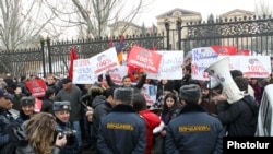 Armenia -- Supporters of Armenia's three leading opposition forces rally outside the parliament building in Yerevan, 28Feb2012.