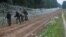 Polish soldiers building a fence on the border between Poland and Belarus near the village of Nomiki on August 26.