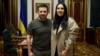 Ukrainian President Volodymyr Zelenskiy (left) poses with Jamala in Kyiv on November 29, 2022.