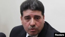 وائل الحلقی، نخست‌وزیر سوریه.