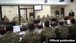 Armenia - Defense Minister Seyran Ohanian (R) addresses the army top brass in Yerevan, 13Feb2012.