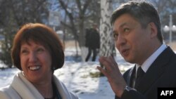 Kyrgyz Foreign Minister Erlan Abdyldaev (right) meets with EU foreign-policy chief Catherine Ashton in Bishkek on November 27. 