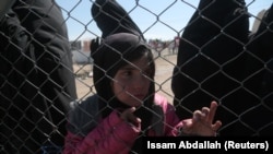 «Аль-Хол» лагериндеги качкын кыз. Сирия. Март, 2019-жыл.