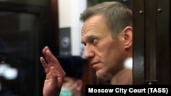 Jailed Russian opposition activist Aleksei Navalny gestures during a court hearing in Moscow in February 2021. 