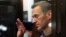 Jailed Russian opposition activist Aleksei Navalny gestures during a court hearing in Moscow in February 2021. 