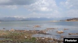 Armenia -- A Lake Sevan shore submerged by rising waters.