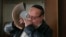Zabulon Simantov, who was the last member of Afghanistan's once-thriving Jewish community, blows the traditional shofar, or ram's horn, at a synagogue in Kabul.