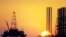 Azerbaijan -- An oil platform near the capital Baku at sunset, 2005