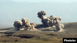 Armenia - Explosions caused by heavy artillery fire during CSTO military exercises at the Marshal Bagramian training ground, 19Sep2012.